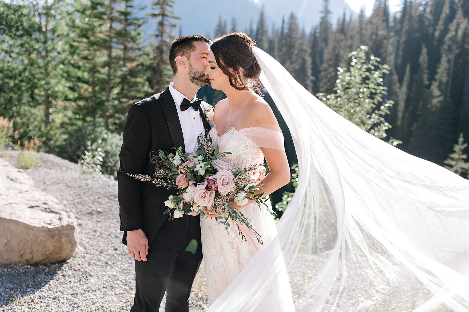 Bride and Groom portraits in Glacier National Park after their Elopement