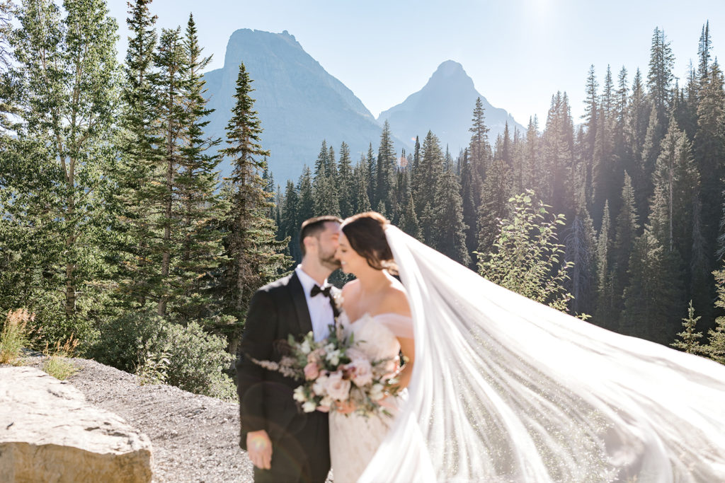 Bride and Groom portraits in Glacier National Park after their Elopement