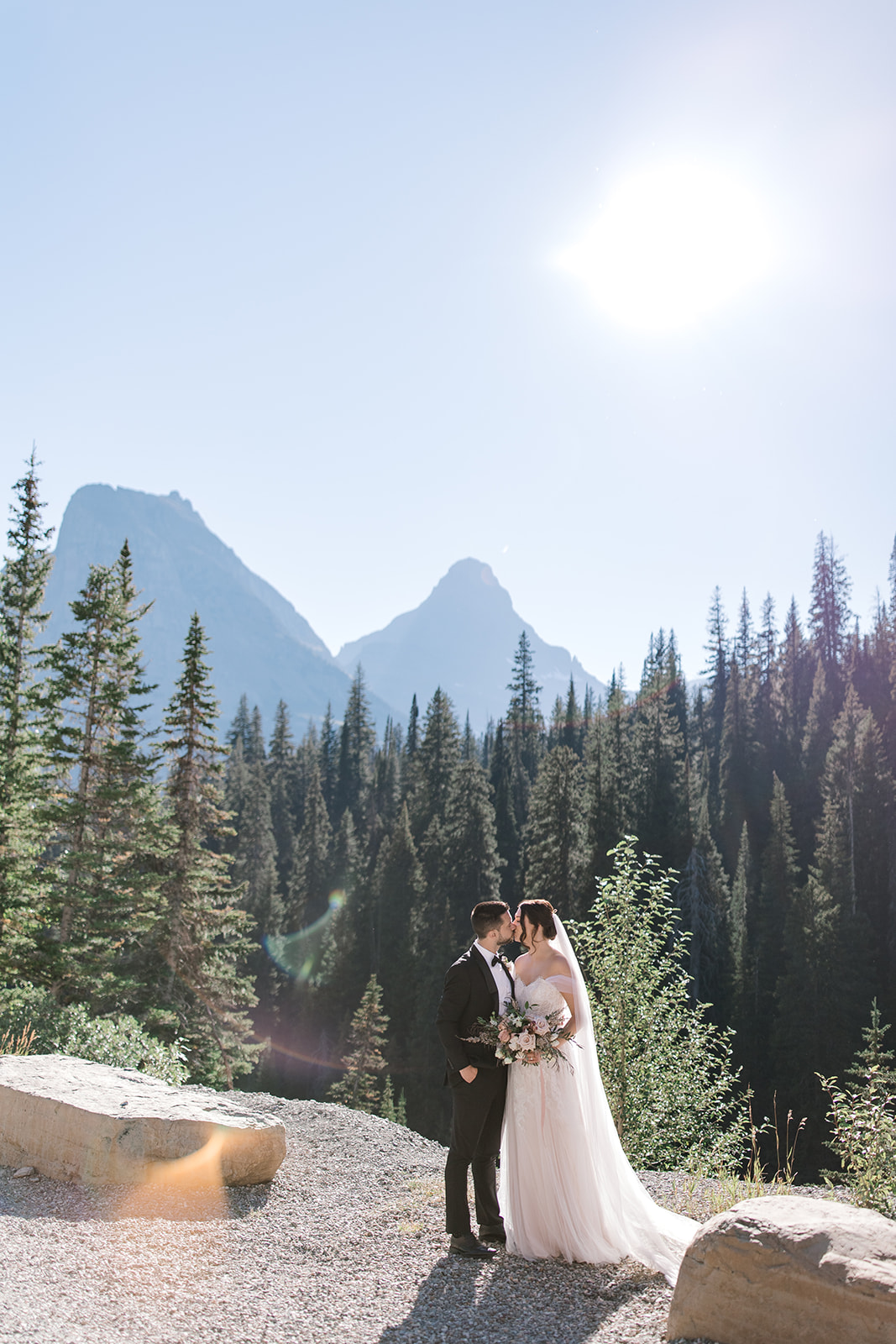 Bride and Groom portraits in Glacier National Park after their Elopement