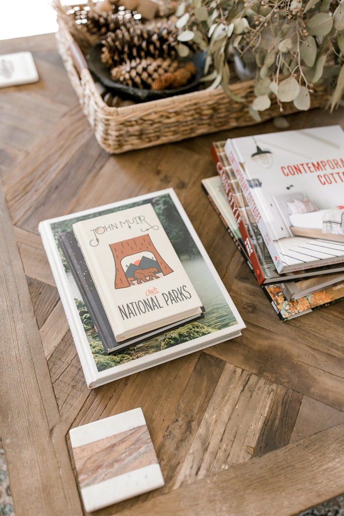 Coffee table decor books in the Whitefish Whalebone Cottage