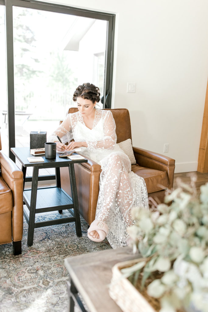 Bride writes her vows in the whitefish cottage